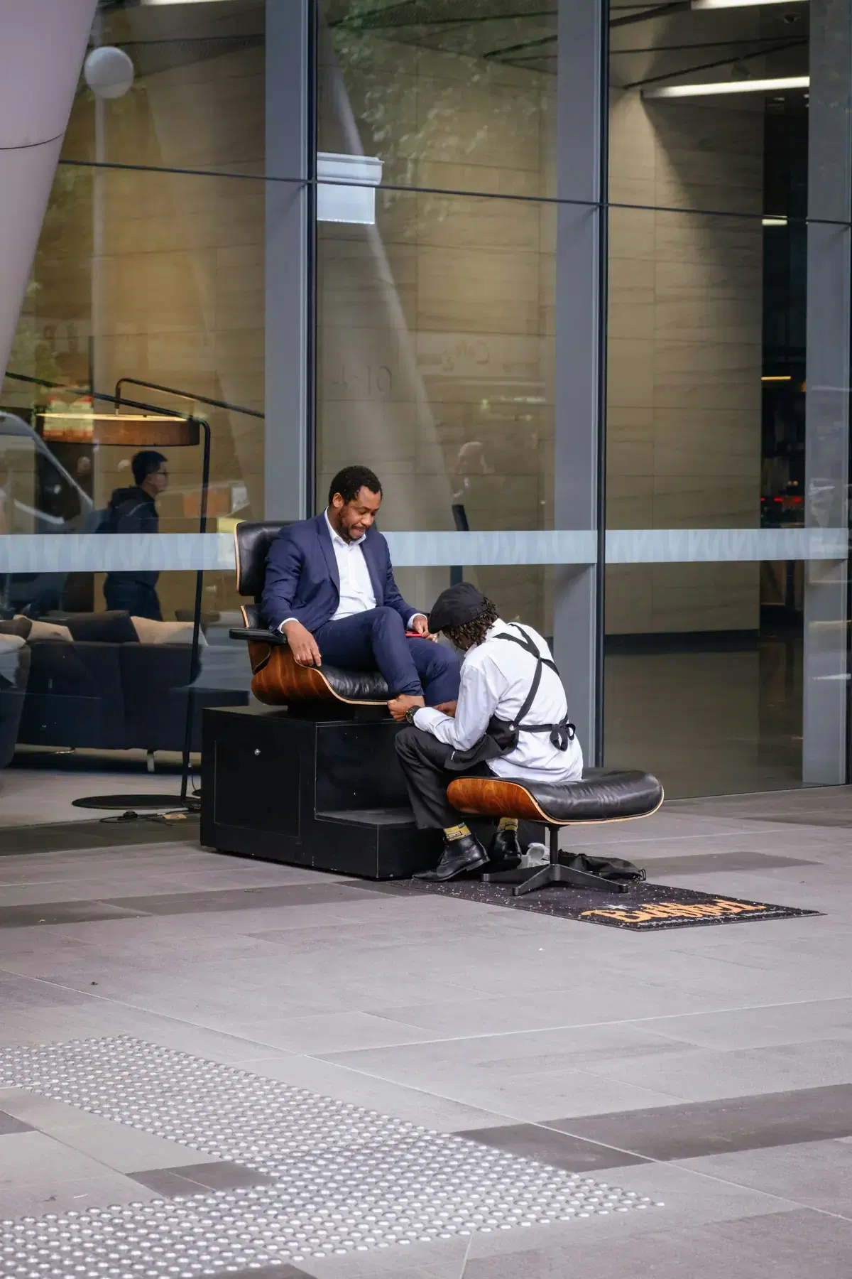 A business owner meeting with a colleague in a modern office